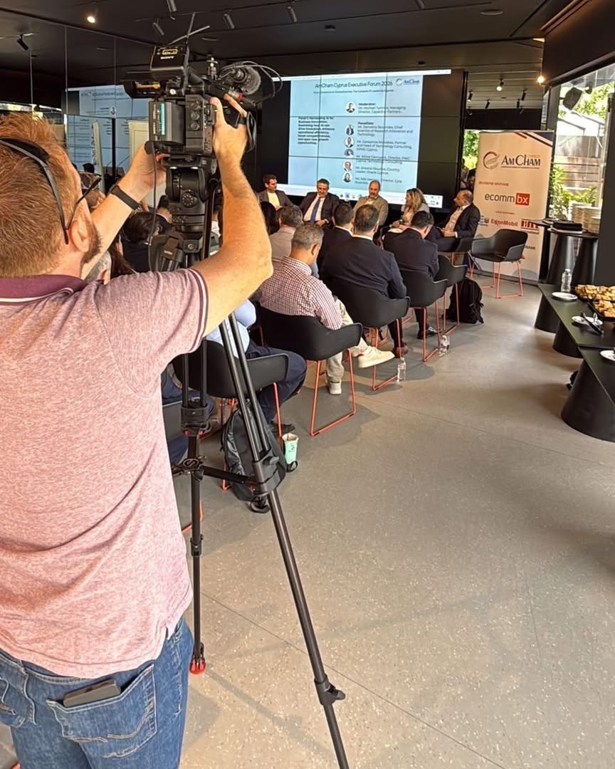 The AmCham Cyprus Executive Forum 2026 panel being filmed in front of the audience