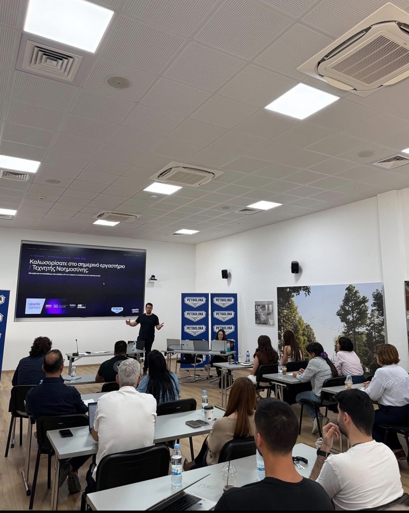 Capacitor Partners opening the AI workshop for Petrolina teams in the training room